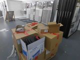 a room with a bunch of boxes on the floor