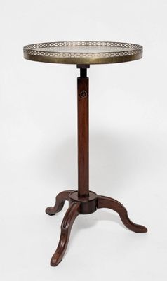 a round table with a wooden base and a metal top