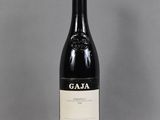 a bottle of wine that is sitting on a table
