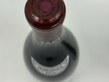 a bottle of wine that is sitting on a table