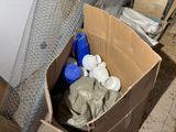a cardboard box with a lot of items inside of it