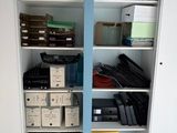 a closet full of files and folders in a room