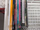 a basket full of books sitting on a table