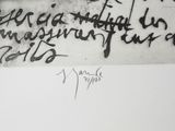 a black and white photograph of a piece of graffiti