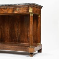 Console en bois de placage montants en colonne, réunies par … (photo 2)