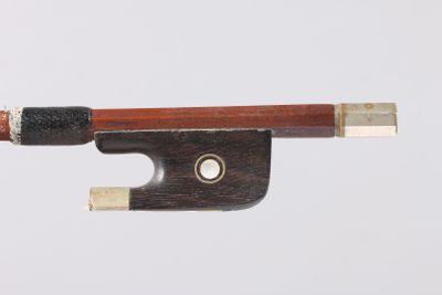 violin bow made of wood and metal with a single piece of string