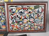 three framed paintings of different shapes and sizes on a white surface