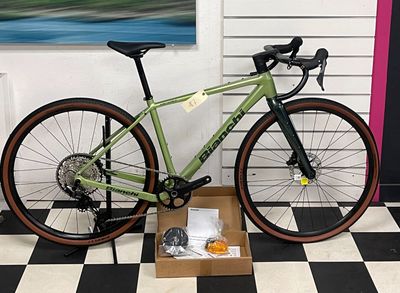 a bike that is sitting in a box on a checkered floor