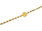 a gold chain bracelet with a coin on it