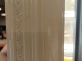 a close up of a glass door with a handle on it