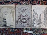 three old books with drawings of a man and a woman on them