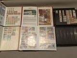 many different types of stamps on a table