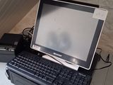 a laptop and a printer sitting on a desk