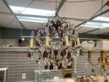 a chandelier hanging from the ceiling in a store