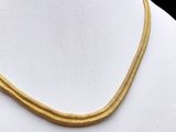 gold plated necklace with a snake skin design
