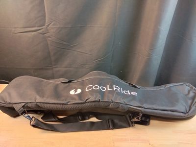an image of a guitar case sitting on top of a wooden table