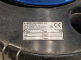 a picture of a metal trash can with a label on it