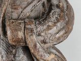 a statue of a man with a hat on his head