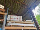 a pile of wood sitting on top of a pile of pallets