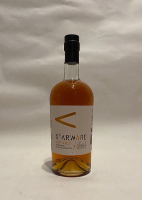 a bottle of wine that is sitting on a table