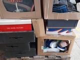 many boxes stacked on top of each other on a pallet