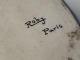 a close up of a plate with writing on it