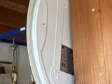 a close up of a wooden pole with a white lid
