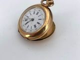 an image of a gold pocket watch with roman numerals on the face