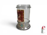 a glass jar with a picture of a woman inside of it