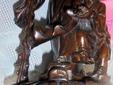 a statue of a woman holding a child on her lap