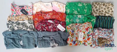 a lot of clothes that are on a table