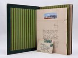 an open book with a picture of a train on the cover
