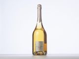 a bottle of wine that is sitting on a table
