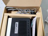a box with a computer inside of it on a table