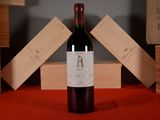 a bottle of wine that is sitting on a table