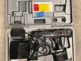 a tool in the case that is sitting on the floor