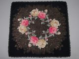a picture of a black square with pink and yellow flowers