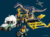 a toy truck with a dinosaur on the back of it and a toy truck with a dinosaur on the back of it