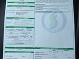 a close up of a car ' s driver ' s license and identification card