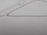 a close up of a chain with a tag attached to it