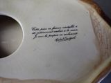 a vase with a quote written on it