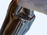 a close up of a person holding a knife in their hand