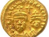 une pièce d'or portant l'image d'un homme