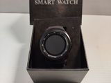 a smart watch that is in a box on the table