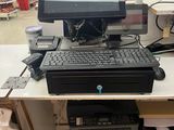 a desktop computer sitting on top of a desk in a store