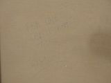 a picture of a drawing on the wall of a bathroom