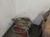 a suitcase sitting on the floor next to a table