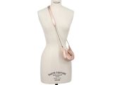 the pink purse is sitting on a mannequin mannequin mannequin mannequin mannequin mannequin mannequin mannequin mann