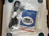 a box that has a charger and a cord in it