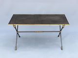 a black and gold coffee table with a black top